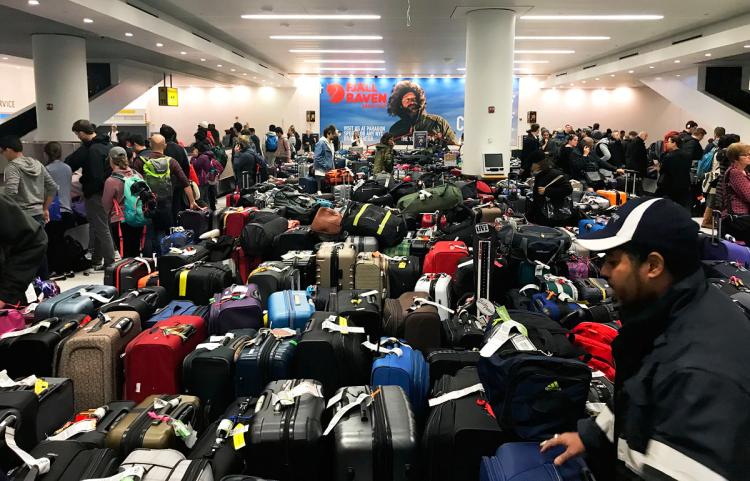 Flooding at JFK airport adds to misery after flight delays