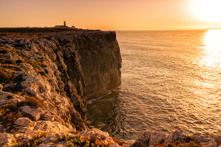 Sunset over Algarve coast. Cape St. Vincent coast, Lagos, Portugal.