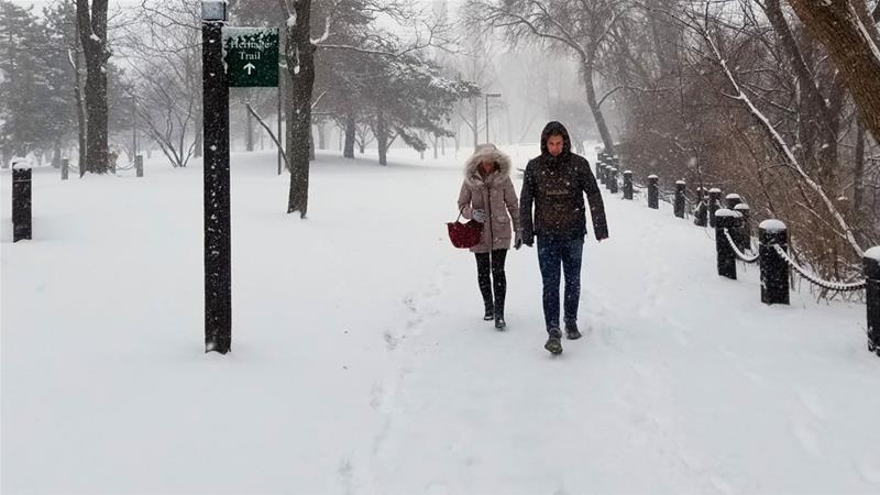 Deadly blizzard fizzles to heavy rain, but some still digging out of snow