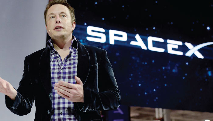 Tesla’s CEO shows off the new Mars-bound spacecraft.