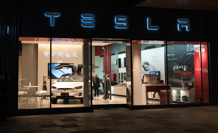 Tesla says robotaxis coming to U.S. roads next year, slams rivals’ use of Lidar