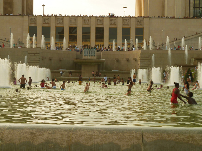 Parched tourists seek gelato and shade in sweltering Paris and Rome