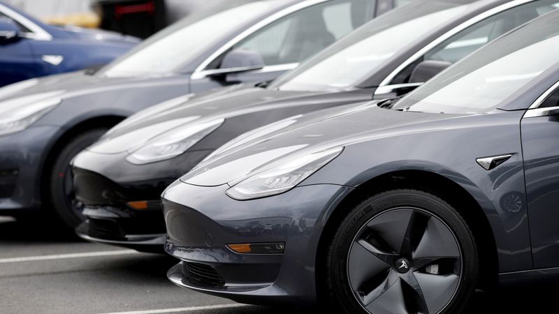 Tesla delivers record number of electric cars in quarter, shares up 7%