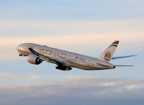 Etihad Airways Boeing 777-200LR taking off at LAX Airport