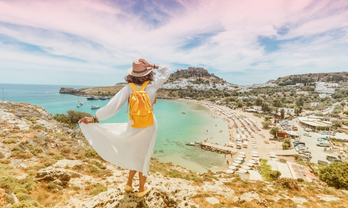As tourists trickle back to resorts, Greeks have modest expectations