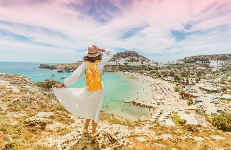 As tourists trickle back to resorts, Greeks have modest expectations